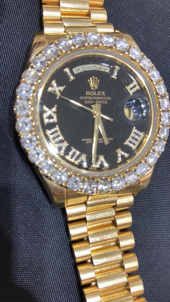 Gold Rolex Watch with Diamonds with Black Face