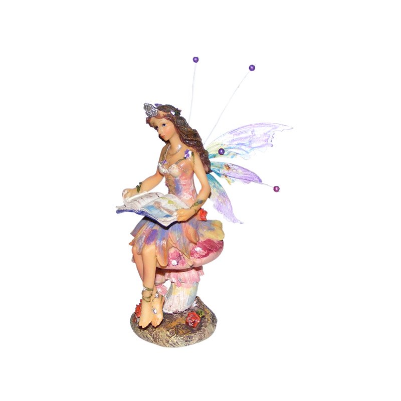 Fairy Sitting on a Toadstool Reading a Book