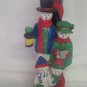 Snowfamily Caroling at Lamp Post