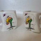 Golfers coffee mug pair oddly shaped "The Results of Overswing" Twisted