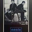 signed OASIS Promotional Poster by 2 band members - includes COA