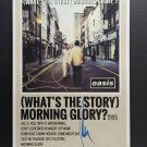 signed OASIS Album Poster by 2 band members - includes COA signed OASIS Album Poster by 2 band members - includes COA