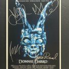 signed DONNIE DARKO Movie Poster by 4 members of the Cast - includes COA signed DONNIE DARKO Movie Poster by 4 members of the Cast - includes COA