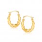 10k Yellow Gold Oval Twist Hoop Earrings D186775