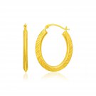 14k Yellow Gold Oval Line Texture Hoop Earrings D71647651