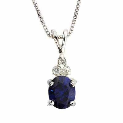 Sterling Silver Oval Simulated Tanzanite CZ with three Simulated Diamond CZ stones P4508TZ