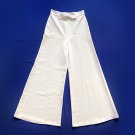 Black Halo women's pants size 6. Off white color, extra wide leg, long. Stylish