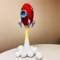 DIY papercraft rocket sculpture for your kid's decor