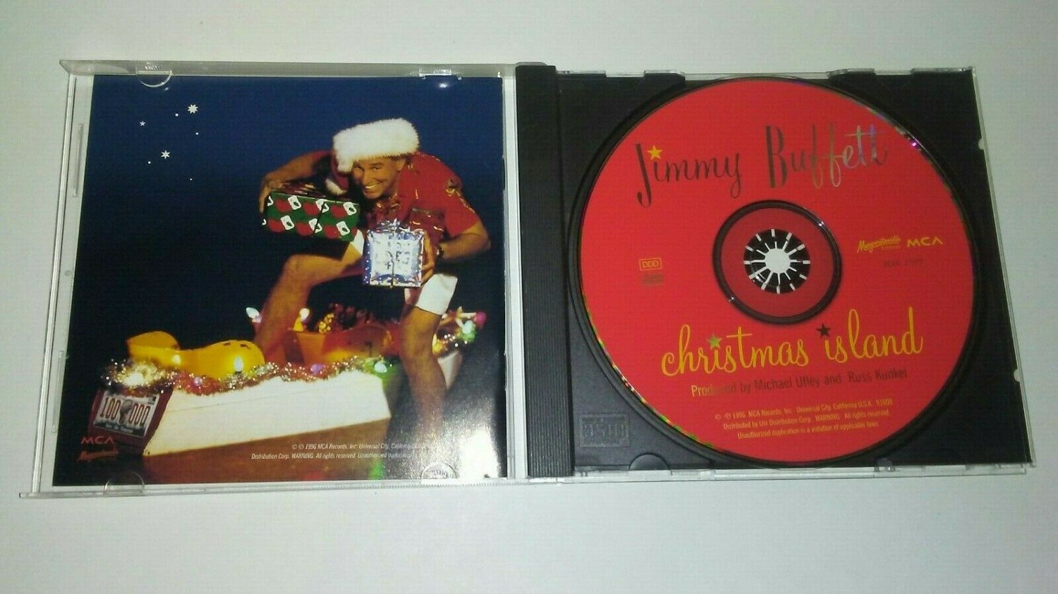 Christmas Island Jimmy Buffett CD 1996 Mele Kalikimaka Ho Ho Ho Bottle