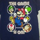 2011 Super Mario Bros The Game Is On Blue Graphic T-Shirt Youth 14 - 16 Nintendo 2011 Super Mario Bros The Game Is On Blue Graphic T-Shirt Youth 14 - 16 Nintendo
