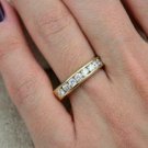 Caratnile 0.70CT Round Near White Moissanite Channel Set Wedding Band 14K Yellow Gold