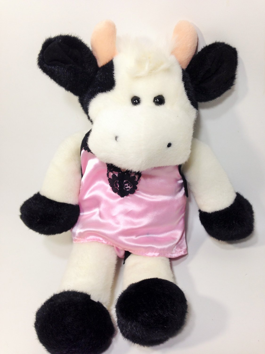 black and white stuffed cow