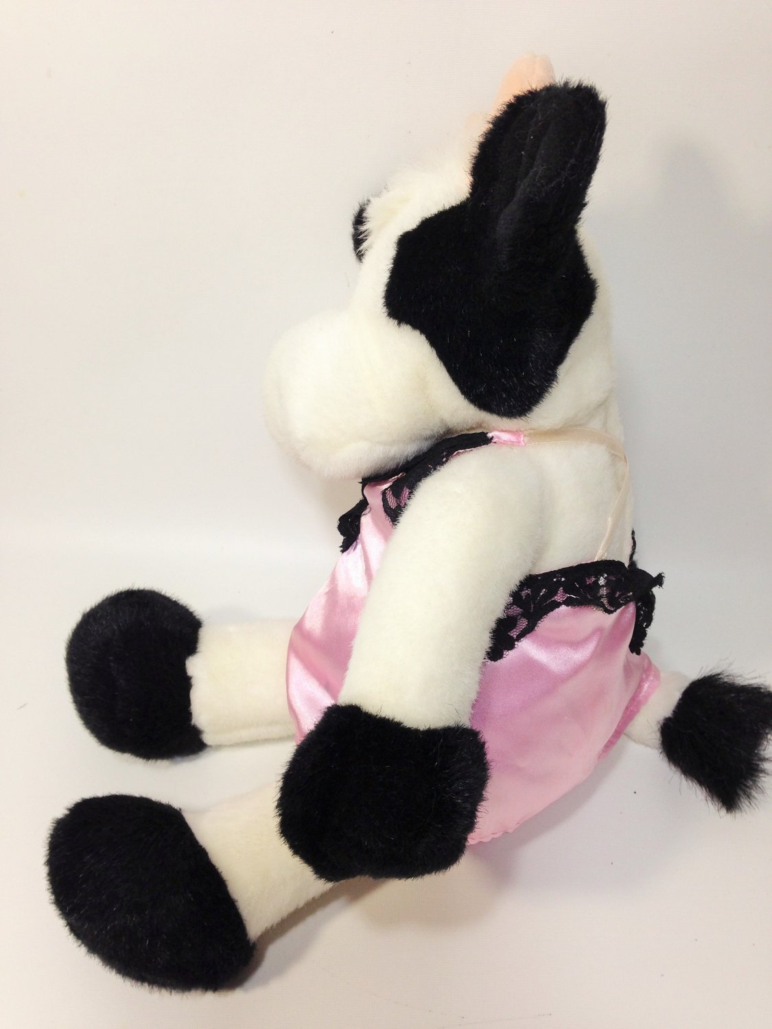 black and white stuffed cow