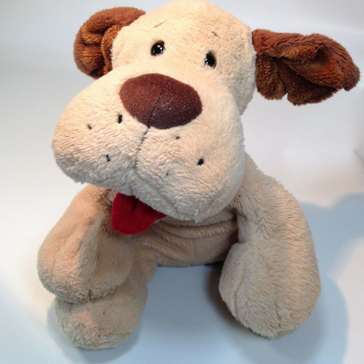 dark brown stuffed dog