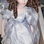 POUPEES CARINE DOLL-DOLL IS IN ORIGINAL BOX AND HAS ORIGINAL HAT AND CLOTHES-19"