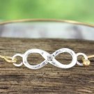 CRAVE WORN TWO-TONE AND CRYSTAL INFINITY BANGLE
