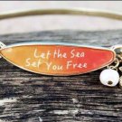 "LET THE SEA SET YOU FREE" SURFBOARD WITH SEA SHELL CHARM