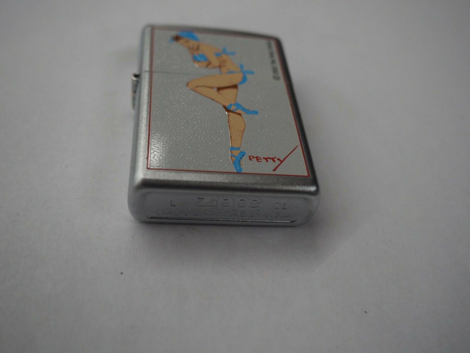 are 2001 Collectable Petty Pin Up "Blue Dancer" Zippo Lighter Free U.S. Shipping