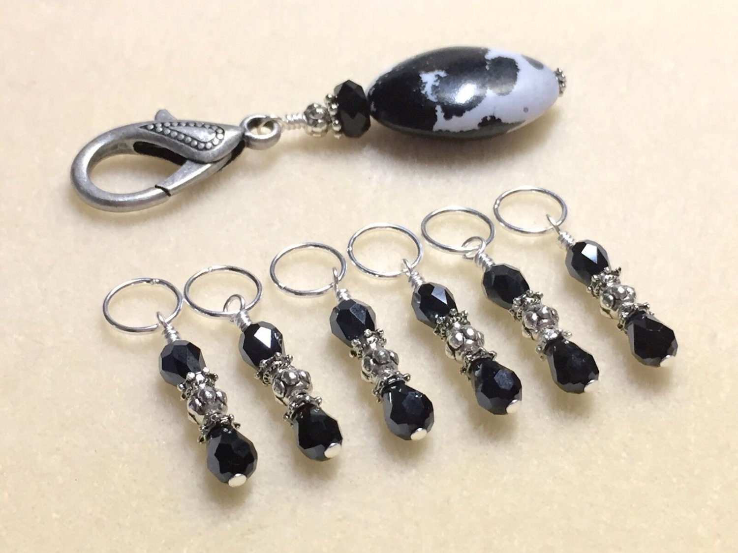 Beaded Crystal Knitting Stitch Markers (SNAG FREE) with Cow Print Clip Holder