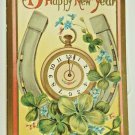 Horseshoe and Clock New Year Best Wishes Div Back Postcard posted 1910