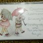 Greeting with 2 Children with Umbrellas  Divided Back Postcard Not Posted
