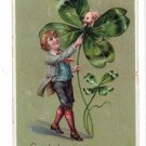ST. PATRICK'S DAY boy 4 Leaf Clover and Pig Tuck Divided Back Postcard Posted