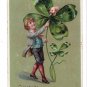ST. PATRICK'S DAY boy 4 Leaf Clover and Pig Tuck Divided Back Postcard Posted