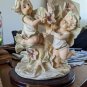 The Mirella Collection Angels Boy And Girl Surrounded By Flowers 10" Planter On