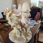 The Mirella Collection Angels Boy And Girl Surrounded By Flowers 10" Planter On