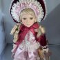 vintage victorian porcelain doll original clothing and umbrella.