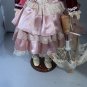 vintage victorian porcelain doll original clothing and umbrella.