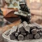 International Pewter Man Pilling Wood Logs Figurine