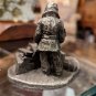 International Pewter Man Pilling Wood Logs Figurine