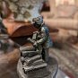 International Pewter Man Pilling Wood Logs Figurine