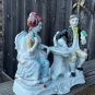 Colonial Couple Porcelain Figurine