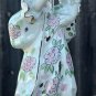 COLONIAL LADY FIGURINE, CREAM COLOR, PINK FLOWERS, GREEN, 9 1/2" TALL, GOLD TRIM