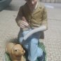 Student With Dog Figurine