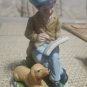 Student With Dog Figurine