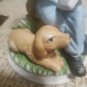 Student With Dog Figurine