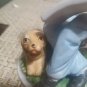 Student With Dog Figurine