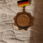 Pin With German Flag And hervorragende leistung in deutsch