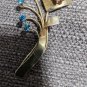 Vintage 50s colorful copper rhinestone flower brooch pin