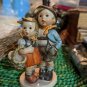 Goebel Hummel Figurine “Surprise” #94 3/0 West Germany Girl w/ Basket & Boy  6”
