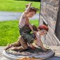 Vintage Girl Ridding Boy Signed Ceramic Figurine