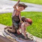 Vintage Girl Ridding Boy Signed Ceramic Figurine