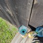 Two Matching Vintage Golden Blue Glass Bud Vases Floral Design