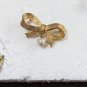 Vintage DUBARRY Gold Tone Ribbon With A Dangling Pearl