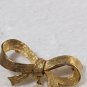 Vintage DUBARRY Gold Tone Ribbon With A Dangling Pearl