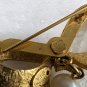 Vintage DUBARRY Gold Tone Ribbon With A Dangling Pearl