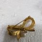 Vintage DUBARRY Gold Tone Ribbon With A Dangling Pearl